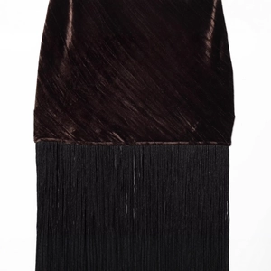 Deep brown velvet midi dress featuring sophisticated black fringe hem and diagonal texture
