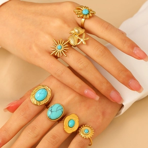 Vintage gold stainless steel rings set with natural turquoise stones for women