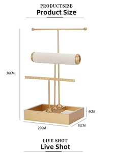 Detailed 3-tier jewelry stand with white velvet rolls and champagne gold metal frame