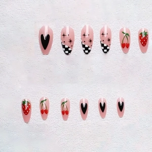 Pink almond press-on nails set with strawberry cherry and checkerboard heart designs