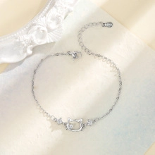 Detailed close-up of S925 sterling silver cat bracelet with sparkling zircon accents