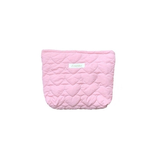 Pink quilted makeup bag featuring embossed heart patterns and a white central logo label