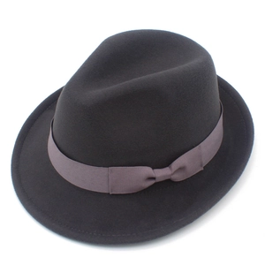 Detailed view of the dark grey wool felt fedora with a matching satin ribbon and bow
