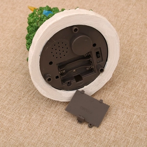 Detail of Christmas tree base with battery compartment and three-way power switch