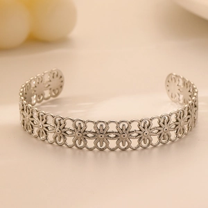Adjustable silver stainless steel open bangle with hollow floral pattern for women