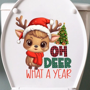 Christmas toilet lid sticker featuring a cartoon reindeer, tree, and festive text
