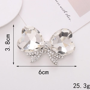 Detail view of crystal butterfly charm with size dimensions and silver heart rhinestones