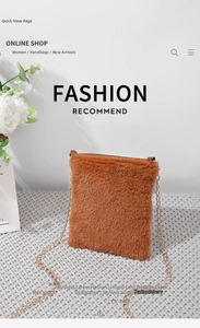 Detailed view of a brown faux fur shoulder bag with an elegant golden chain strap