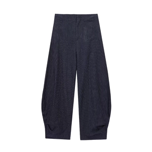 Navy blue striped linen blend balloon pants with white vertical pinstripes and loose fit
