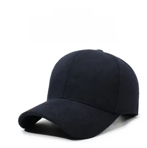 Detail of wool-textured winter baseball cap with curved brim and thick warm thermal fabric