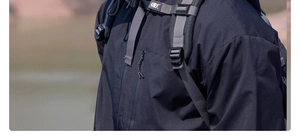 Detail of waterproof zipper and adjustable chest buckle on professional outdoor jacket