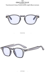 Dettaglio degli occhiali da sole grigio trasparente con lenti blu chiaro e rivetti dorati
