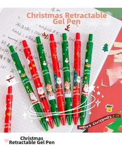 Detail view of festive red and green retractable Christmas gel pens with cartoon patterns