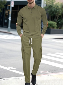 Detail of men's olive green two-piece set with long sleeve polo and drawstring cargo pants