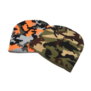 Women's warm winter camouflage knit beanies in orange and green patterns for outdoor wear