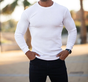 Close-up of white slim fit men's long sleeve T-shirt with vertical ribbed texture