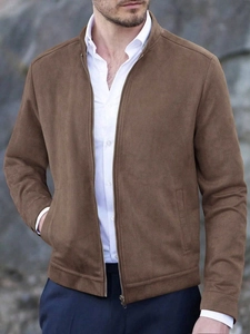 Close-up of a brown suede jacket for men featuring a stand collar and full zip closure