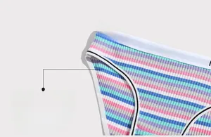 Close-up of rainbow striped cotton rib fabric and I LOVE YOU lettered elastic waistband