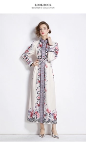 Full view of floral print maxi dress with stand collar and waist belt on model
