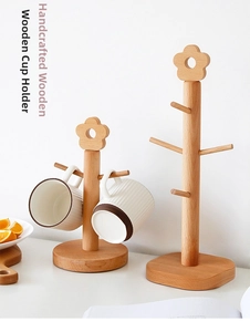 Detail of beech wood tree-shaped cup holders in two sizes with floral top design