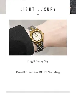 Close-up of luxury women's watch with crystal bezel and bicolor stainless steel strap