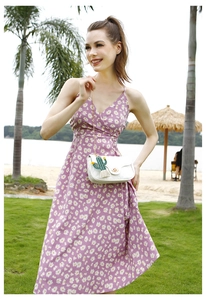 Summer vacation look featuring a white cactus tassel bag paired with a floral dress