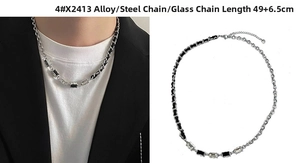 Detail of silver steel necklace with black leather wrap and inlaid glass stones