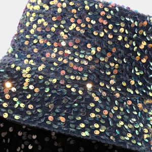 Macro shot of colorful sequins and LED light details on this sparkly bucket hat