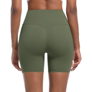 Close-up of olive green high-waisted yoga shorts with V-shaped seam for lifting effect