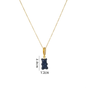 Colorful gummy bear necklace with blue pendant and sparkling crystals on gold chain