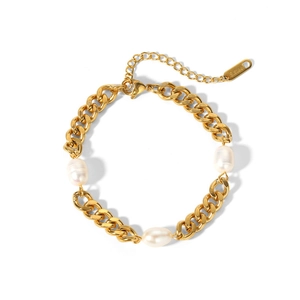 Detailed macro view of 18K gold plated Cuban chain bracelet with three white oval pearls
