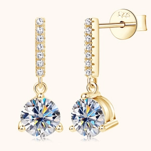 Macro detail of S925 silver double loop earrings with sparkling moissanite stones