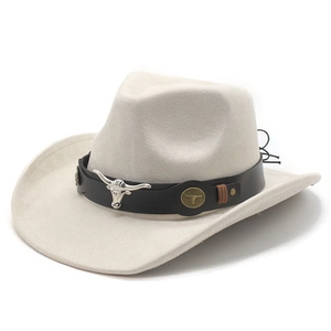 Detail of western cowboy hat with silver bull head ornament and leather band trim