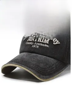 Detail of washed denim baseball cap with ANTRIM 1978 3D embroidery and contrast brim