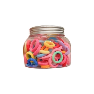 Colorful high elasticity hair bands for girls in a clear plastic storage jar