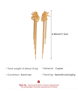 Detailed view showing 11.2cm length and copper material of flower tassel earrings