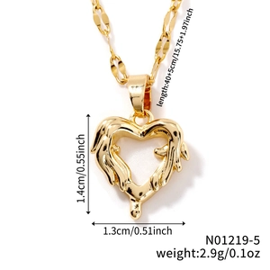 Macro shot of gold heart pendant necklace showing dimensions 1.4cm x 1.3cm and 2.9g weight