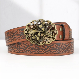 Bohemian brown leather belt with embossed leaf patterns and floral bee metal buckle