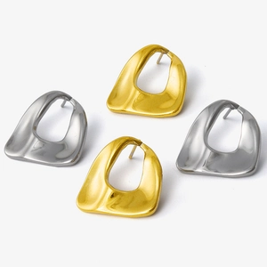 Detail of minimalist 304 stainless steel geometric hollow earrings in gold and silver