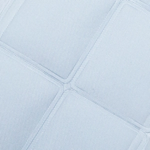 Macro detail of light blue quilted fabric showing breathable cross-twill woven structure
