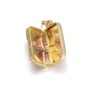 Detailed close-up showing a blank jewelry display base with 18K gold plating finish
