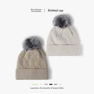 Damen Winter Strickmütze Zopfmuster Dick Gefüttert Warm Outdoor Kunstpelz Bommel Modische Beanie