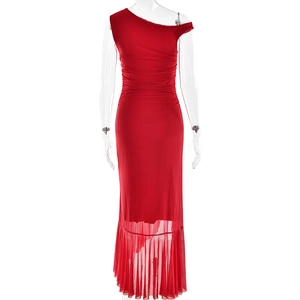 Detail view of red one-shoulder dress with pleated bodice and sheer mesh irregular hemline