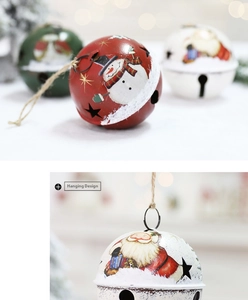 Detail of metal Christmas bells with Santa graphics, star cutouts and hemp hanging rope