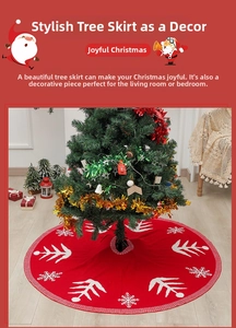 Macro shot of red knitted Christmas tree skirt with white snowflake and tree patterns