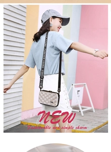 Detail of silver quilted crossbody bag with stylish Forever Young lettered wide strap