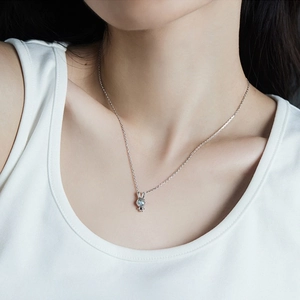 Astronaut rabbit necklace with blue moonstone pendant on silver clavicle chain for women