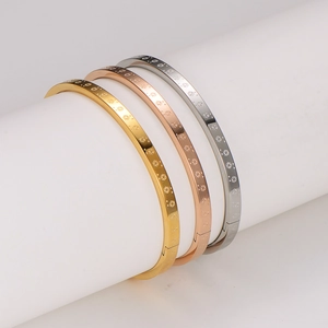 Ensemble de 3 joncs en acier inoxydable avec flocons en or, argent et or rose