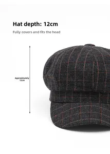 Detail of dark grey and orange plaid newsboy hat with a deep 12cm crown for a snug fit
