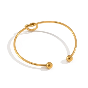 Bracciale rigido minimalista placcato oro 18K con nodo e terminali a sfera lucidi